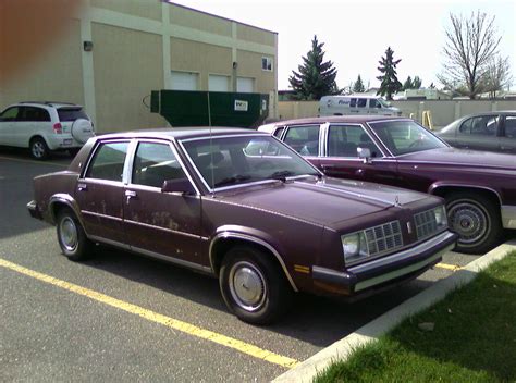 1984 burgondy Oldsmobile omega